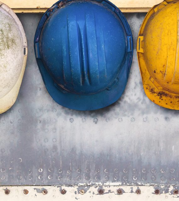 Hard hats worn on site by the Spirotech team