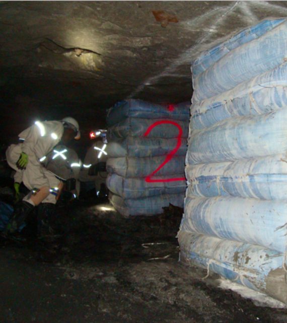 Crew handling support packs underground