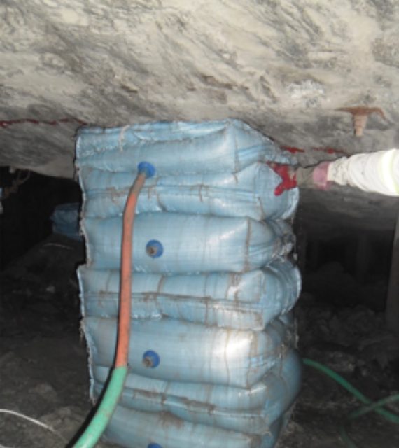 Support pack being pumped into place underground